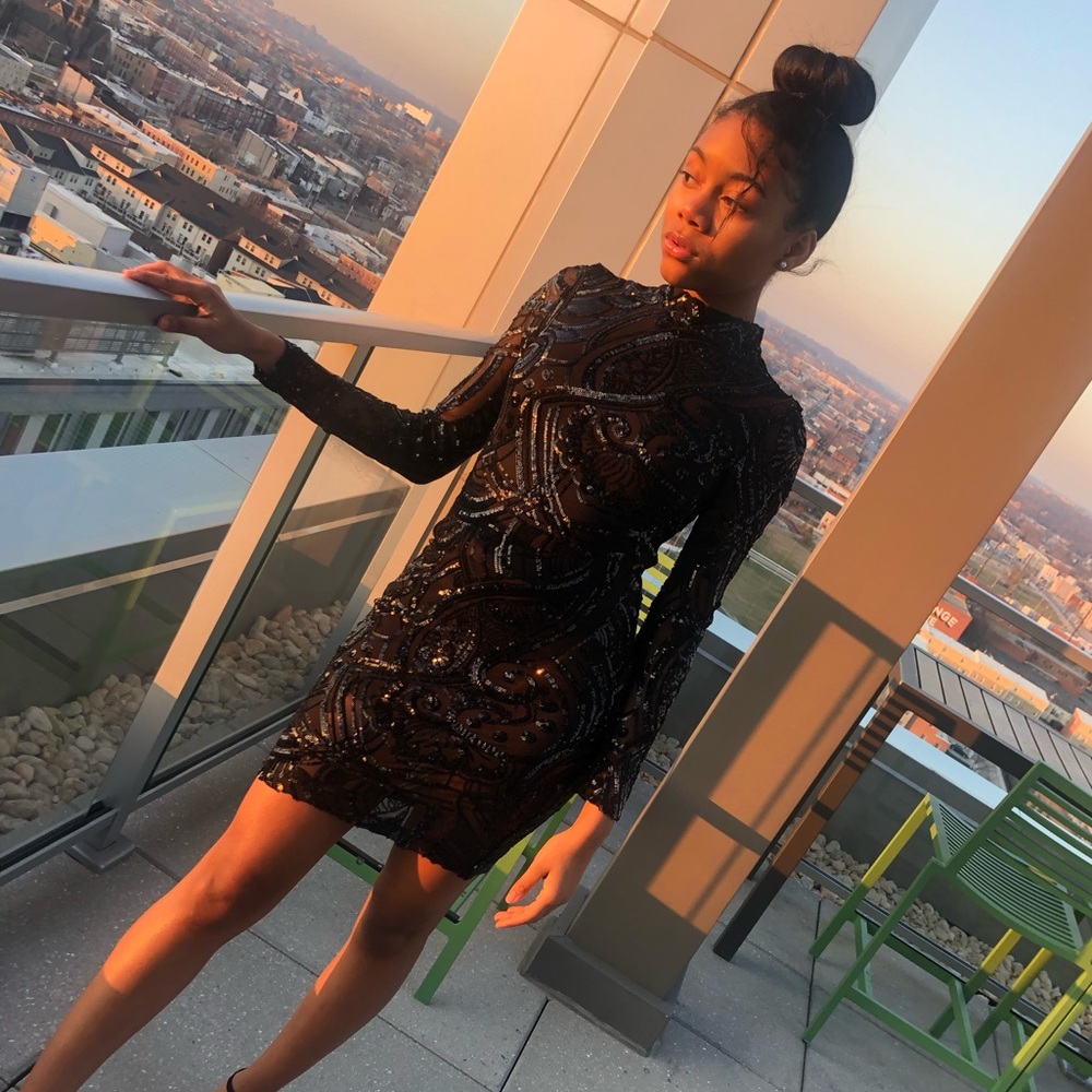 A sequined black dress